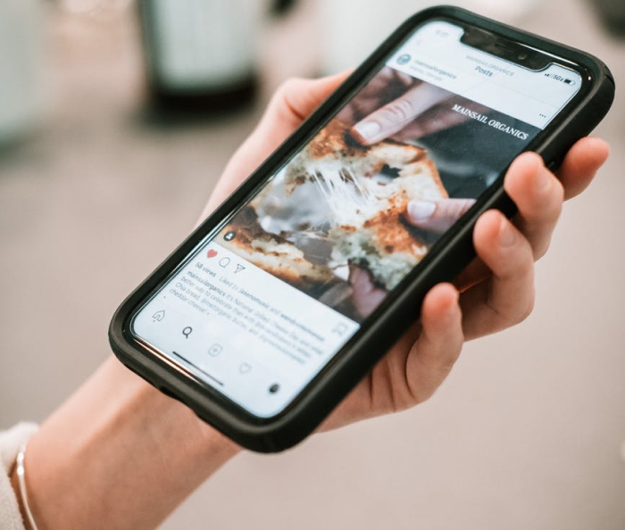open Instagram page on smartphone's screen